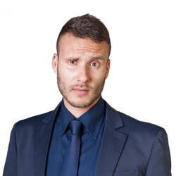 facial expressions of a young businessman isolated on a white background